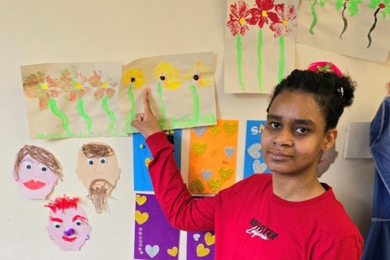 Seonaide showing off her wonderful artwork.