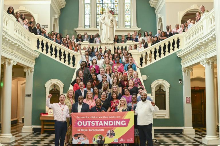 Cllrs Anthony Okereke and Adel Khaireh with members of the Council's Children's Services, celebrating the 'outstanding' Ofsted result