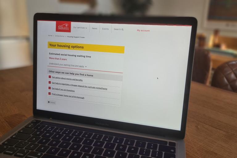 A webpage is open on a laptop, indicating the user's likely wait for social housing is more than 2 years. The pages lists other options including: Get advice about money and benefits, Get help to negotiate a cheaper deposit, Get help if you're homeless and Find a cheaper home out of the borough