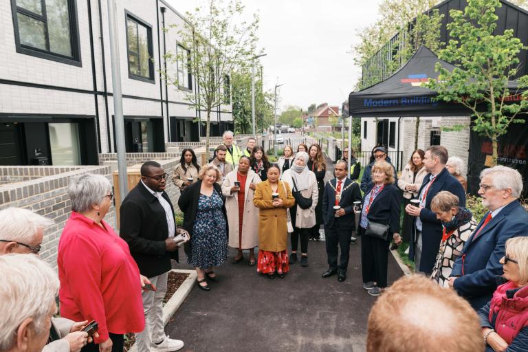 Photo of Leader of the Council Cllr Anthony Okereke making a speech to members of Councillor Grice's family, Mayor of Greenwich Cllr Jit Ranabhat, MP Clive Efford and councillors past and present 
