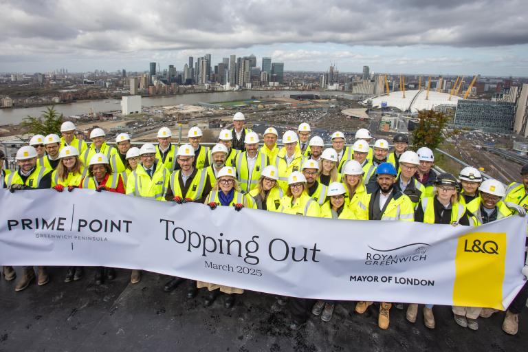 A group picture with representatives from Royal Borough of Greenwich, Greater London Authority and L&Q to mark the topping out at Prime Point