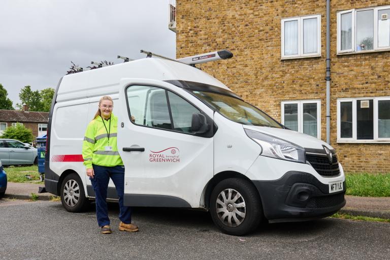 Royal greenwich staff standing by a van with the door open