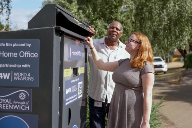 Cllr Rachel Taggart-Ryan and Cllr Olu Babatola looking into the Thamesmead weapon surrender bin