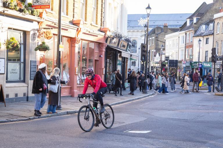 A picture of a cyclist in Greenwich Town Centre