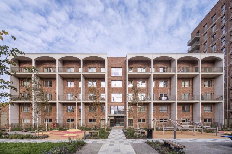 A photo of Kidbrooke Park Road North, the first phase of a 452 home carbon neutral social housing development.