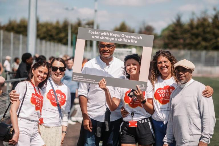 Staff and foster carers at a football match in aid of fostering awareness