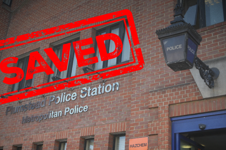 Outside of Plumstead Police Station with a red stamp which says 'SAVED'