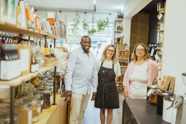 Cllr Anthony Okereke and Cllr Jackie Smith with a business owner 