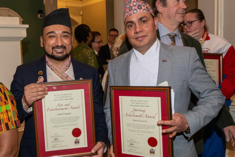 Civic Award winners showcasing their certificate