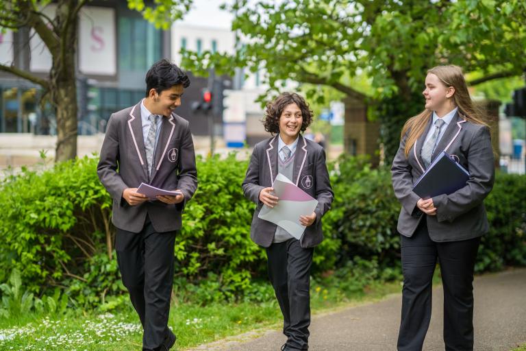 Students in school uniform walking 