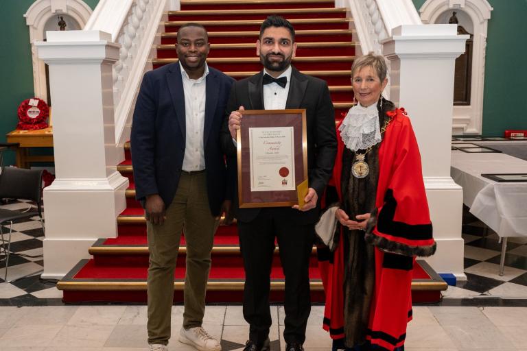 Cllr Anthony Okereke and Cllr Linda Bird with Hussam Lone, Civic Award winner
