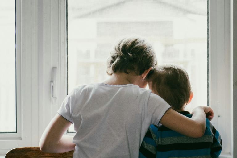An image showing two young people