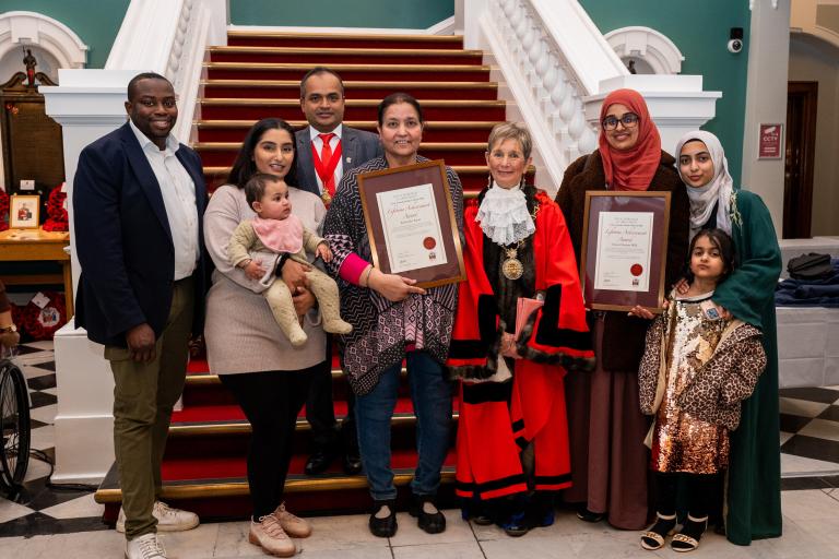Cllr Anthony Okereke, Linda Bird and Jit Ranabhat with the family of the late Ameen Hussain