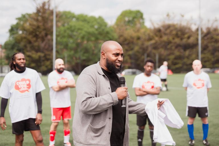 Cllr Adel Khaireh, speaking at fostering football event