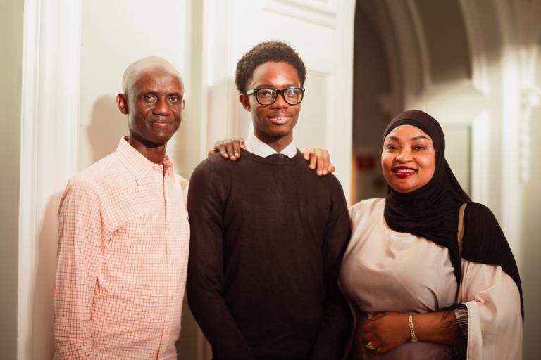 Proud parents with student