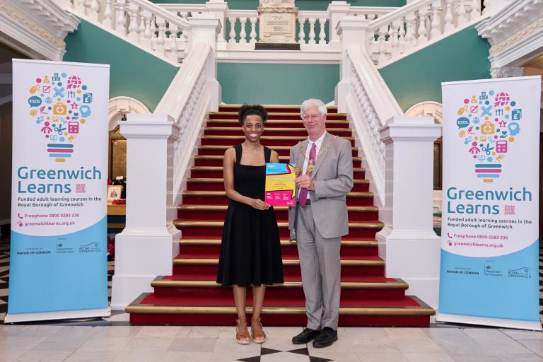 Jessia at the Town Hall holding her certificate with the Mayor, Cllr David Gardner