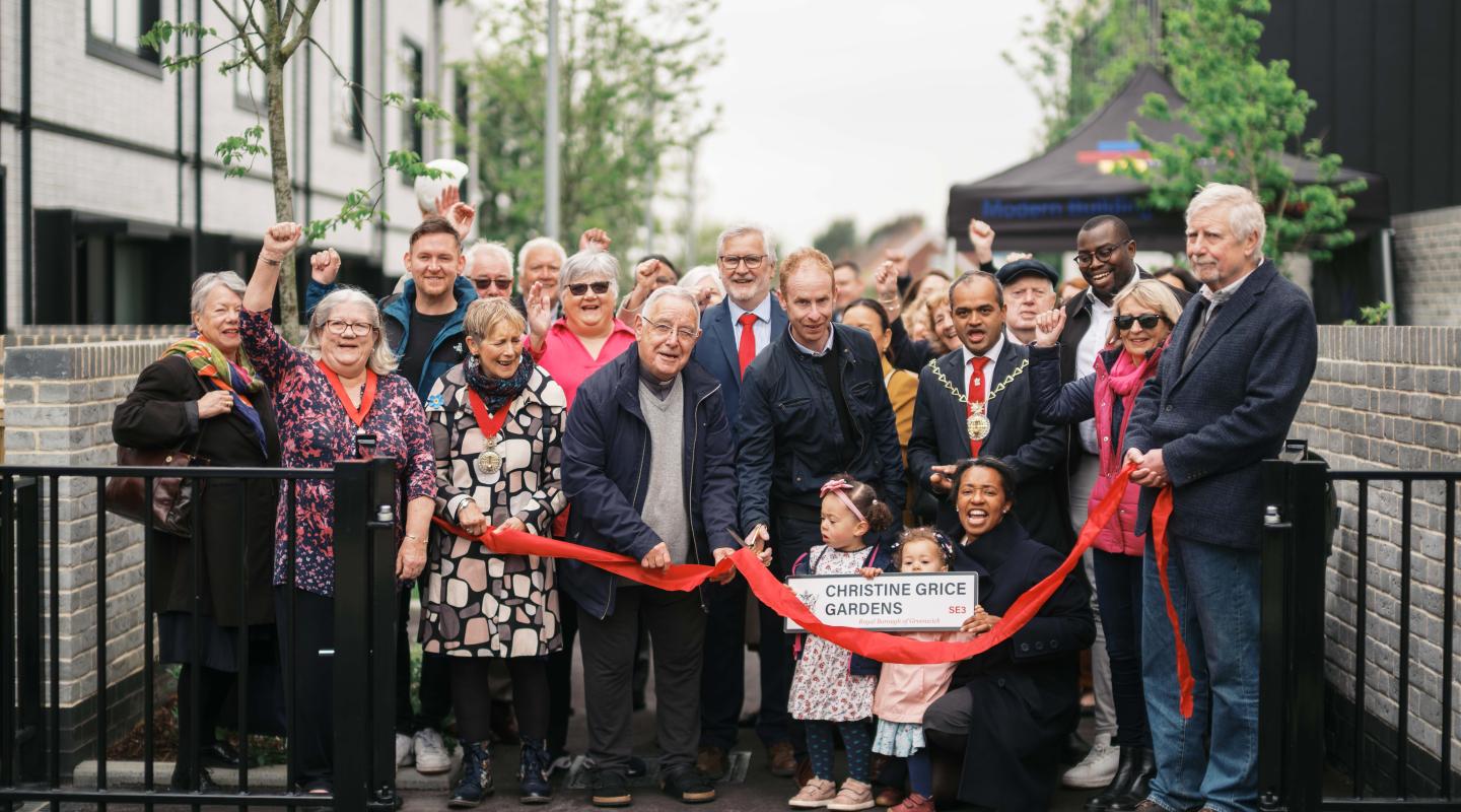 Photo of Councillor Grice's family, Mayor of Greenwich Cllr Jit Ranabhat, Leader of the Council Cllr Anthony Okereke, MP Clive Efford and councillors past and present cutting a ribbon to open Christine Grice Gardens