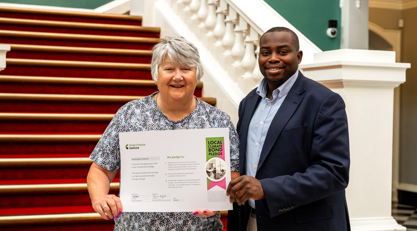 Councillor Denise Hyland and Councillor Anthony Okereke holding llimate pledge certificate