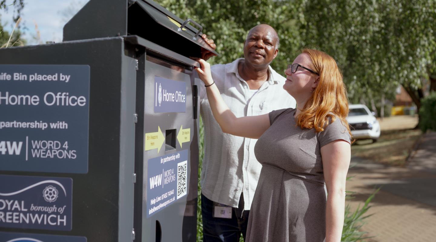 Cllr Rachel Taggart-Ryan and Cllr Olu Babatola looking into the Thamesmead weapon surrender bin